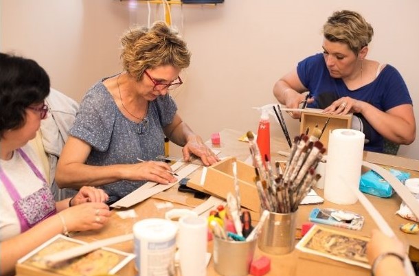 Group of women painting